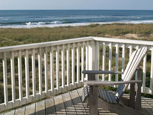 oceanfront deck with adirondack deck chair